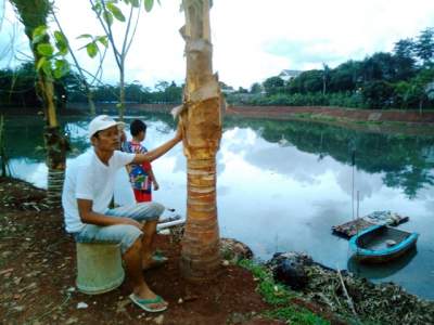  Suhanda Johan alias Kimo merenung melihat kondisi Situ Perigi, POndok Aren, Kota Tangsel.
