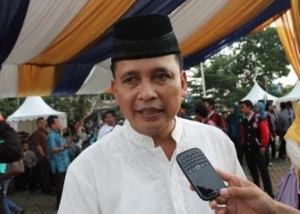 Kepala Dinsosnakertran Kota Tangsel, Purnama Wijaya